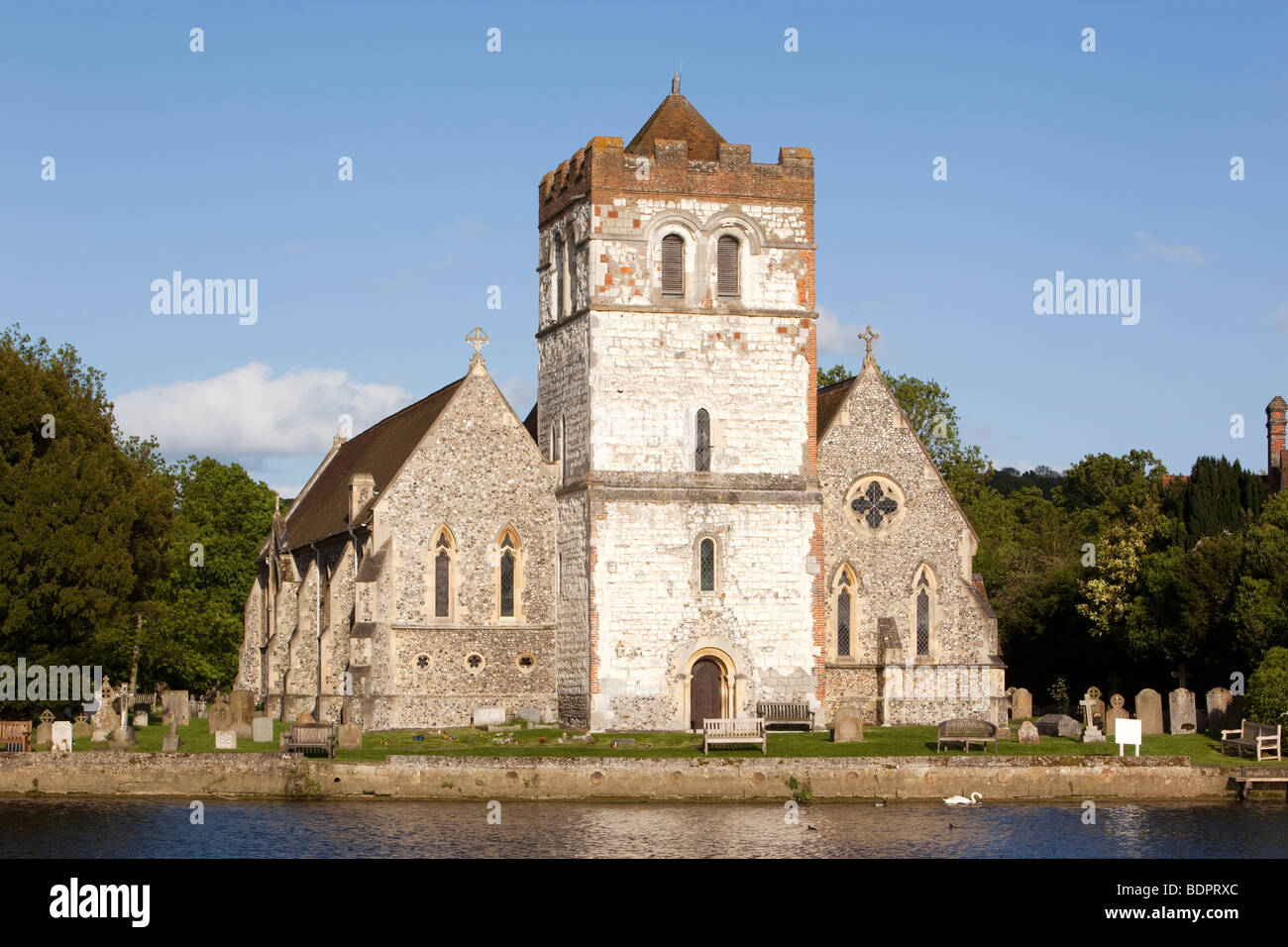 UK, England, Berkshire, Bisham, Thames riverbank All Saints church with landmark chalk (clunch) stone tower Stock Photo