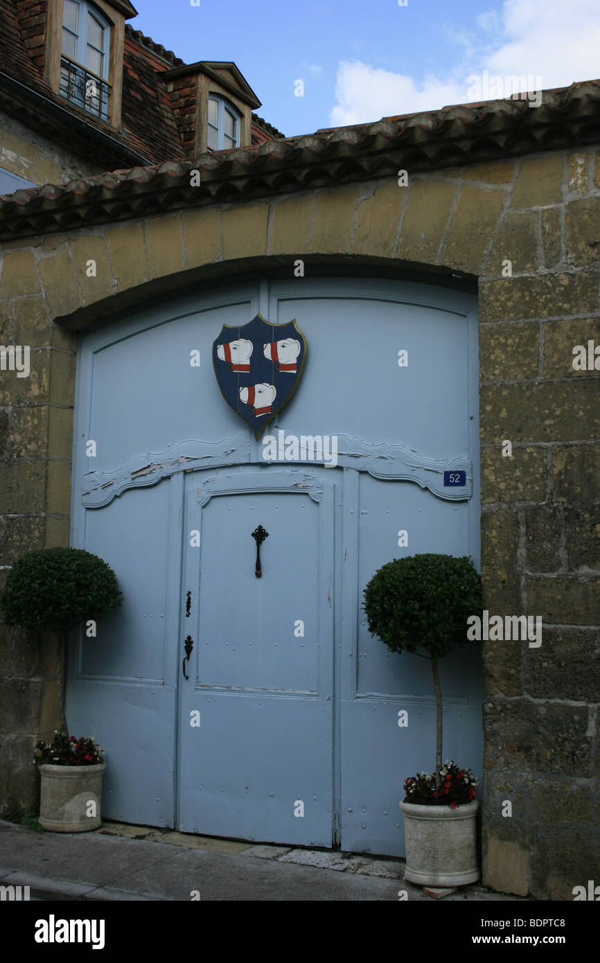 Blue door in the bastide of Monpazier, Dordogne Stock Photo