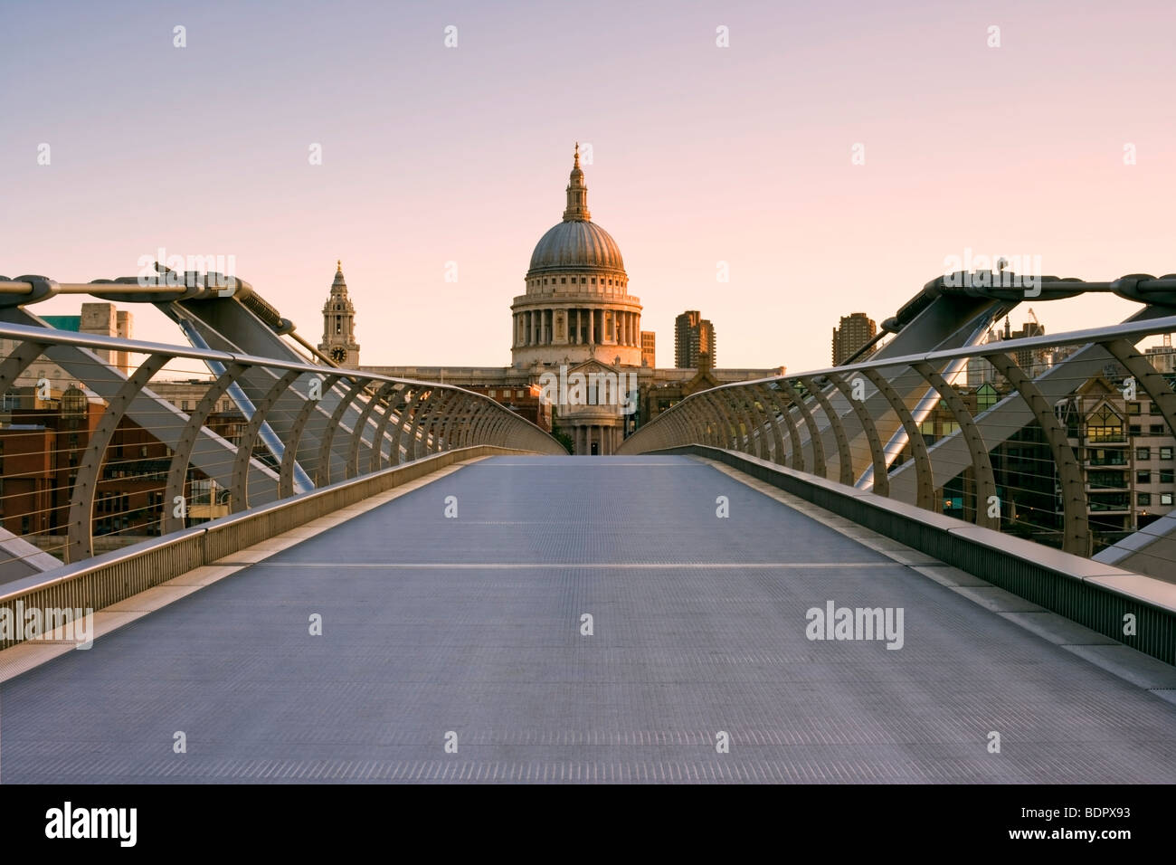 Symmetric view of the Millennium Bridge with St Paul's Cathedral in the background in London Stock Photo