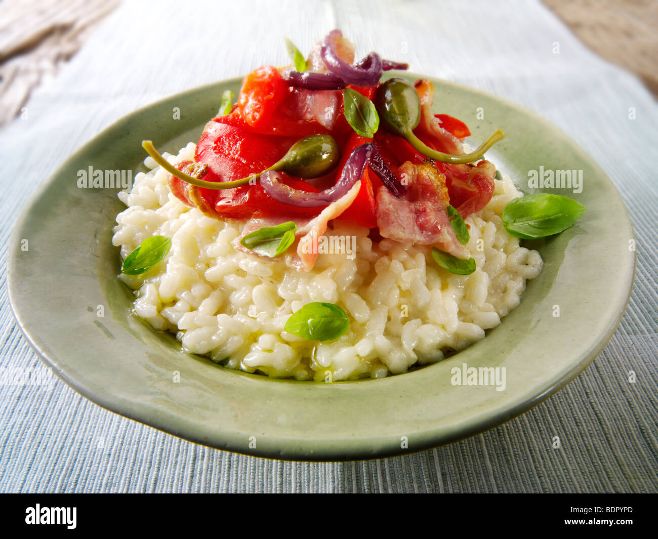 Classic risotto with Roast peppers, vegetables and bacon Stock Photo