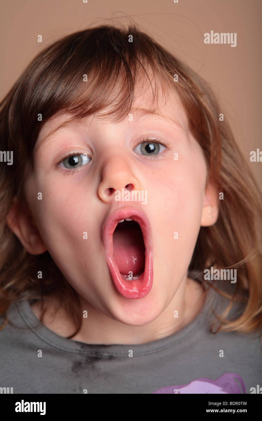 Young girl making faces Stock Photo - Alamy