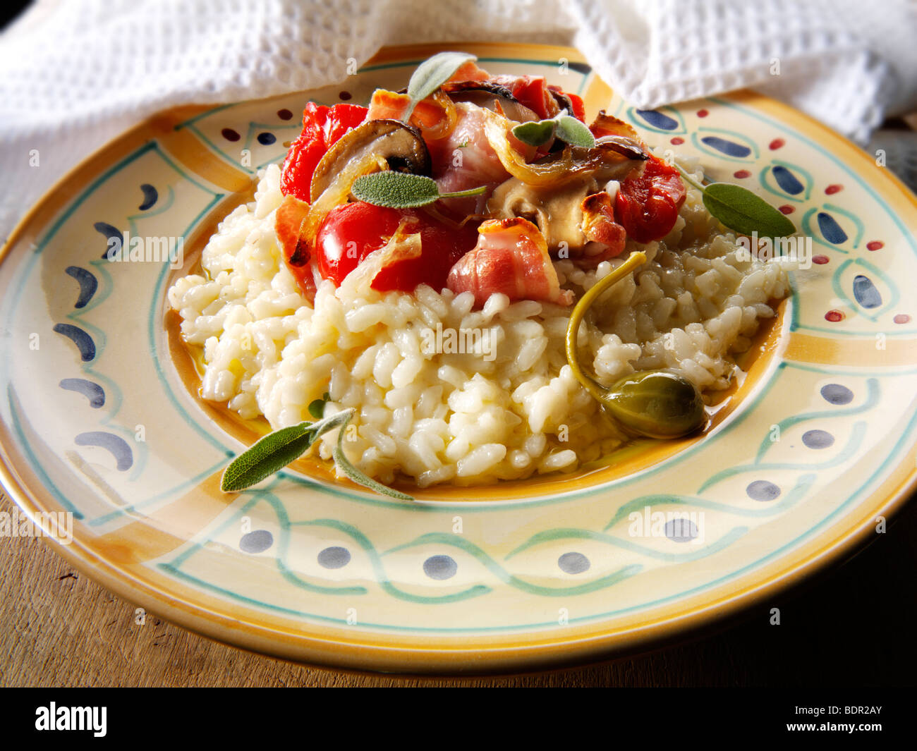 Classic risotto with Roast peppers, vegetables and bacon Stock Photo