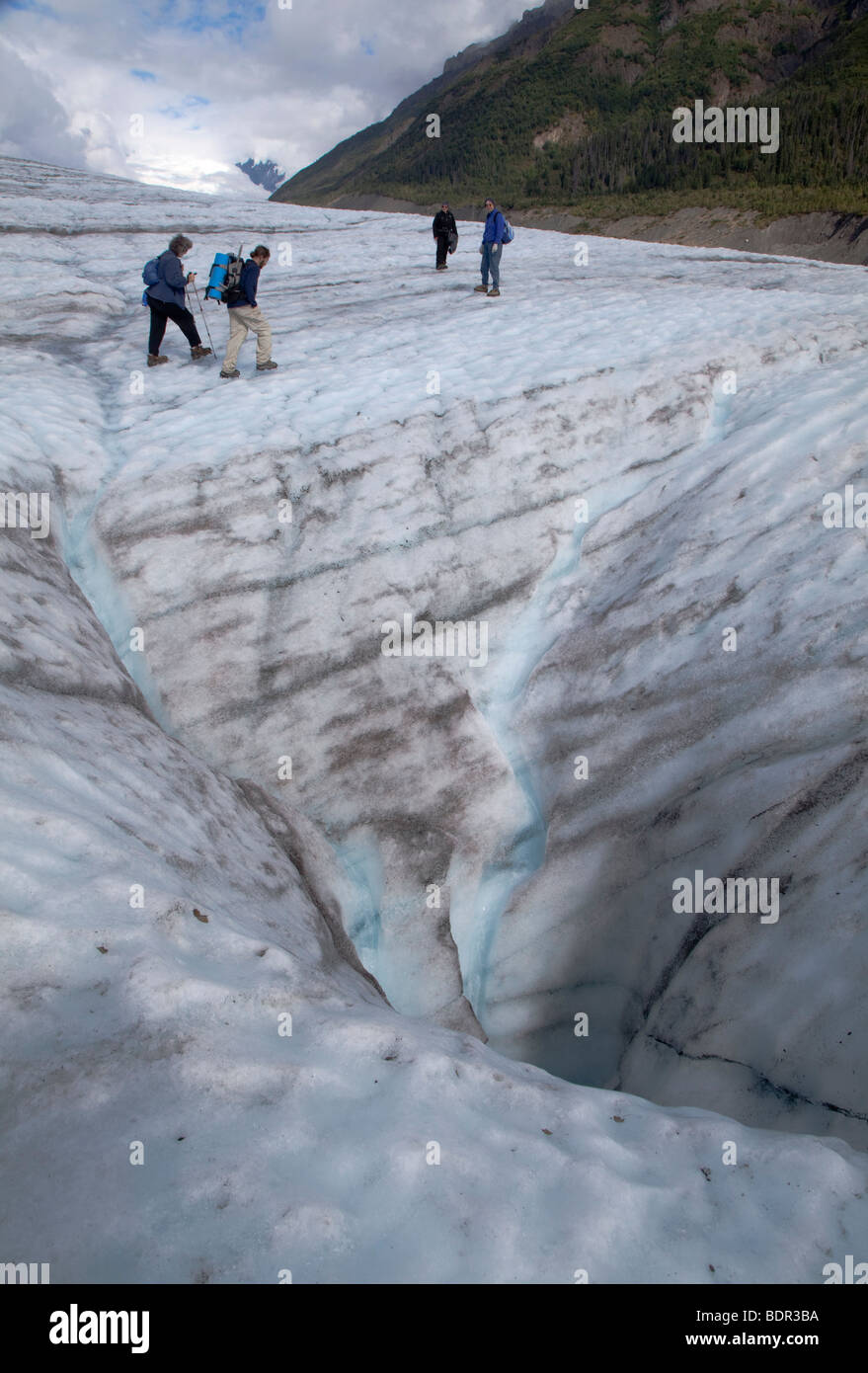 Hikers on the Root Glacier in Wrangell-St. Elias National Park Stock Photo