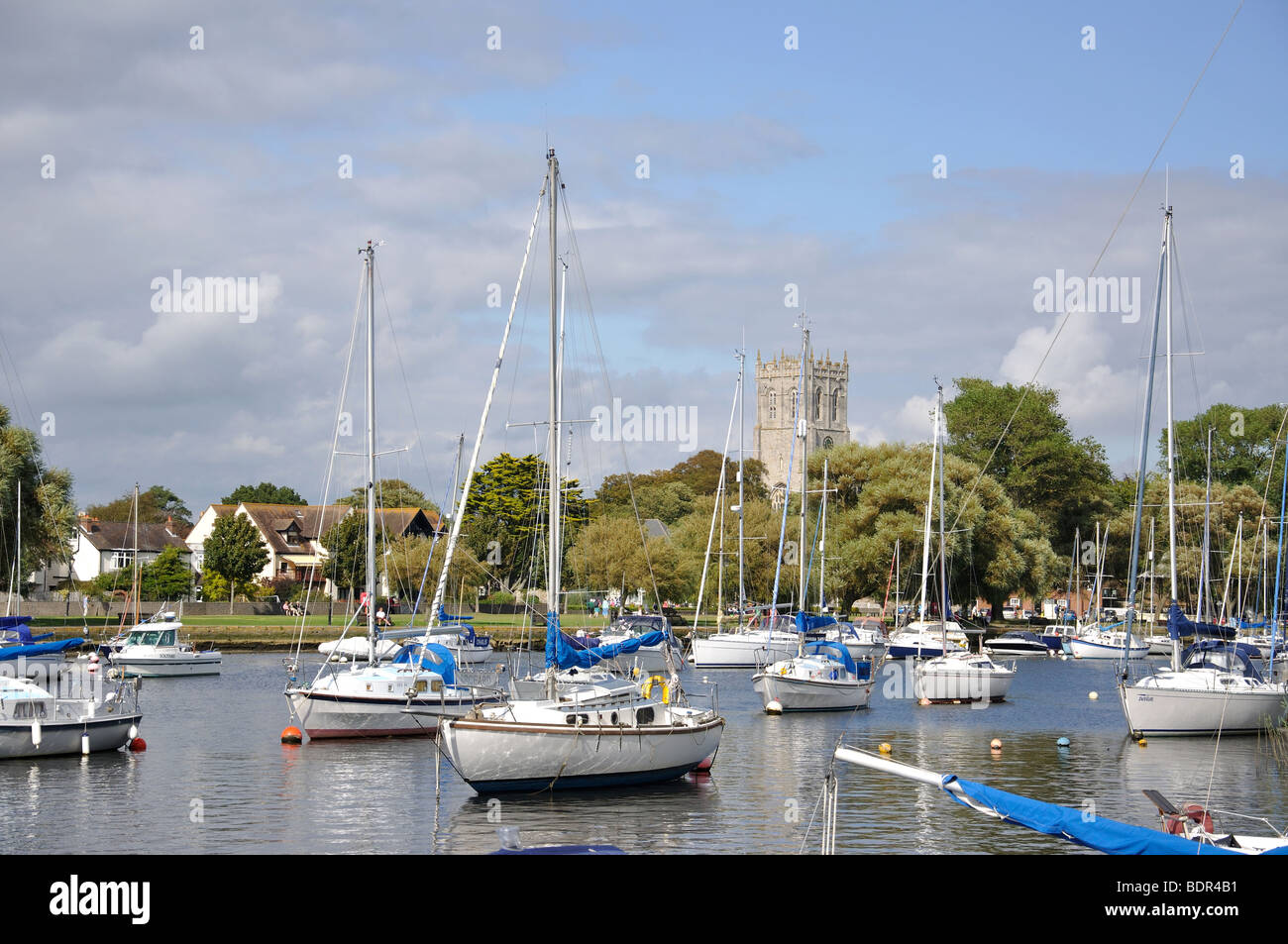 Town view from Wick Marsh across River Stour, Christchurch, Dorset, England, United Kingdom Stock Photo