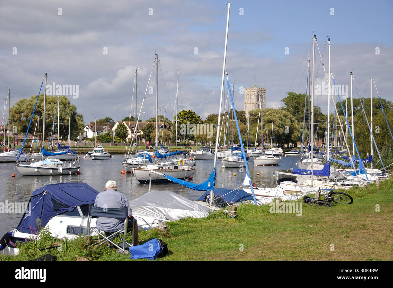Town view from Wick Marsh across River Stour, Christchurch, Dorset, England, United Kingdom Stock Photo
