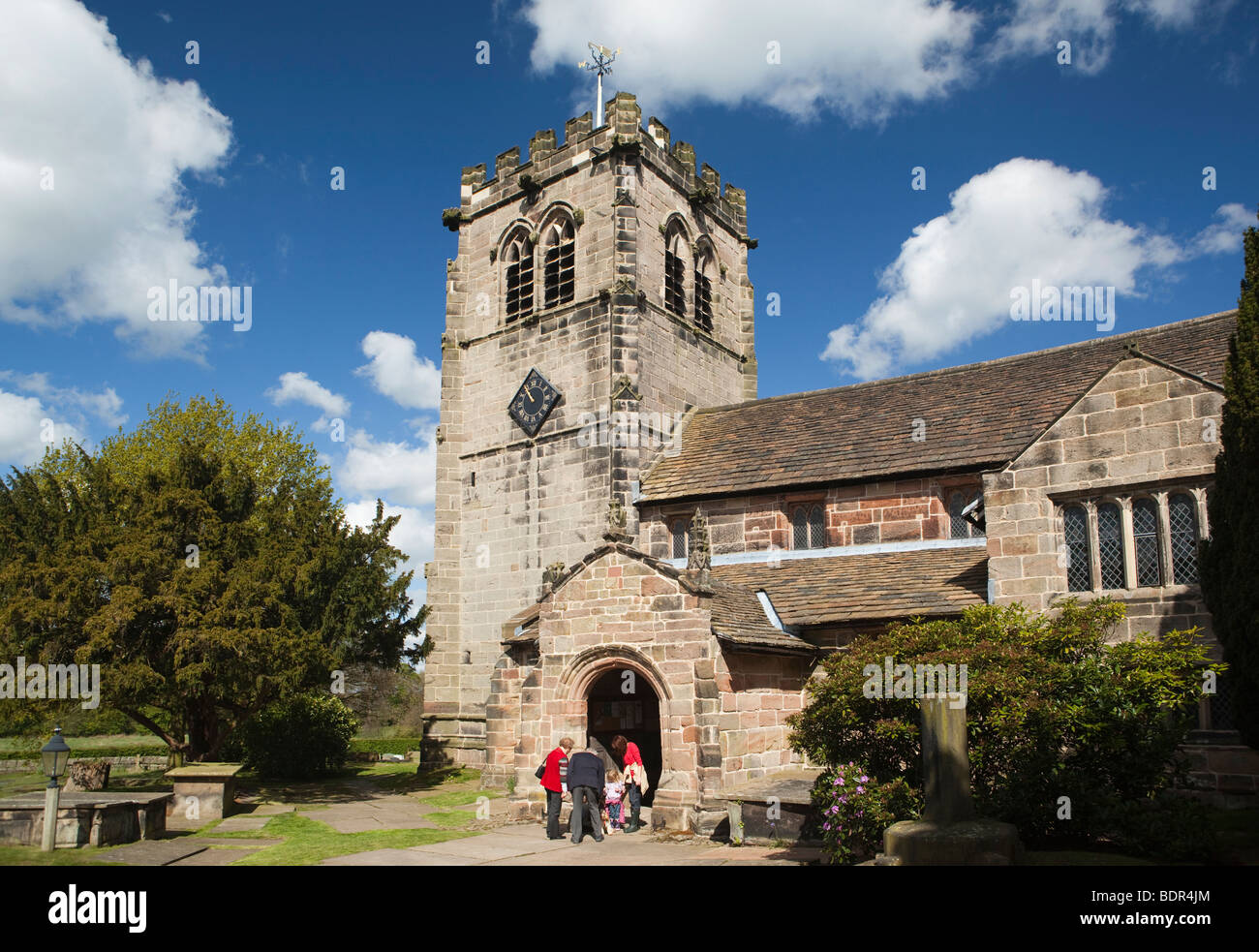 UK, England, Cheshire, Nether Alderley, St Mary’s Church, parishioners arriving for a service Stock Photo