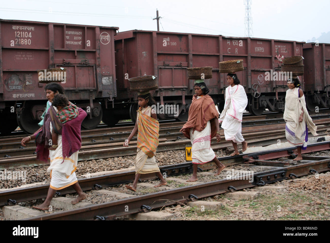 Dongariya Kondh Tribe Women Walking Along Railway Track Stock Photo