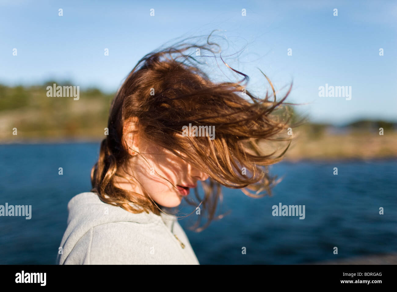 A girl with wind in her hair Stock Photo