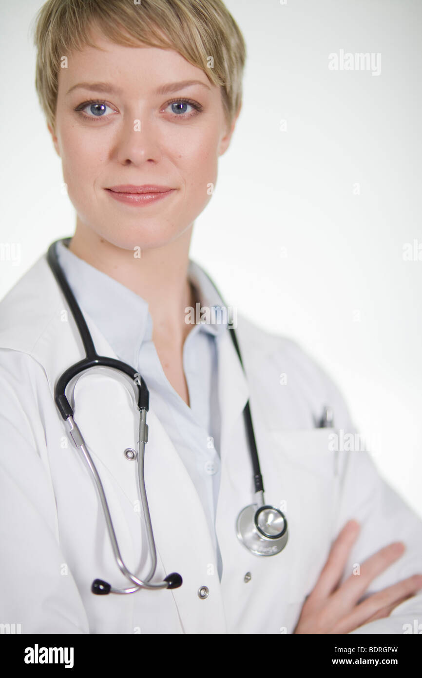 Caring female doctor smiles hi-res stock photography and images - Alamy