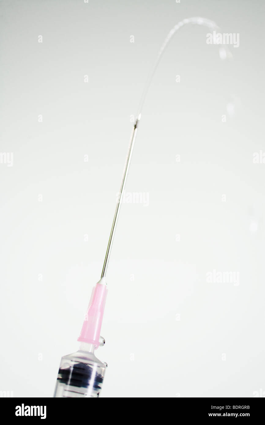 An injection needle close-up Stock Photo - Alamy