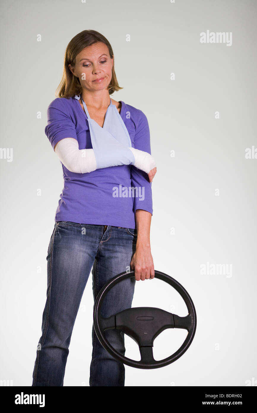 A woman hurt in a car accident. Stock Photo