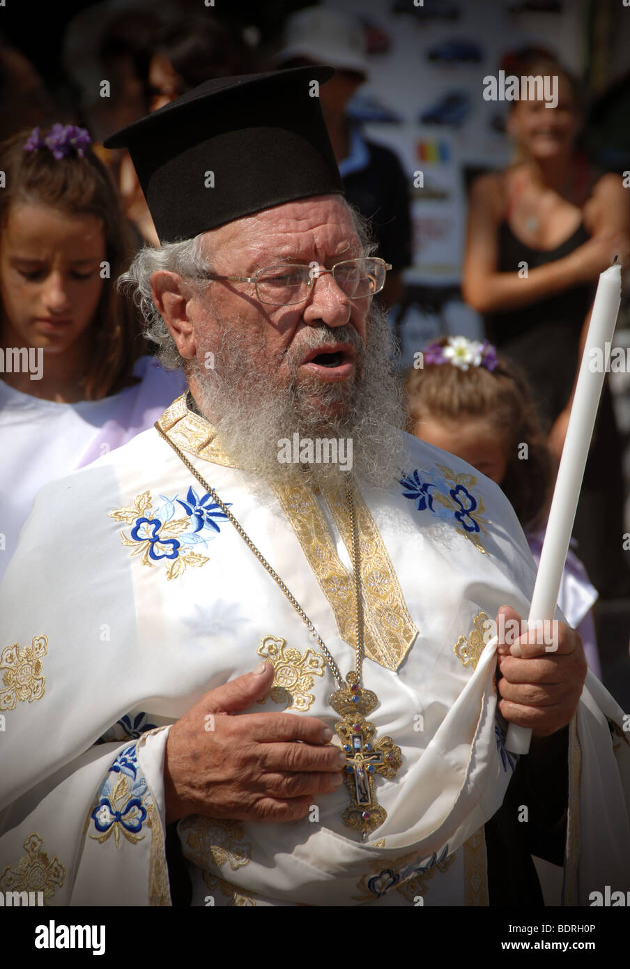 Greek Orthodox Priest during religious procession, Corfu Stock Photo