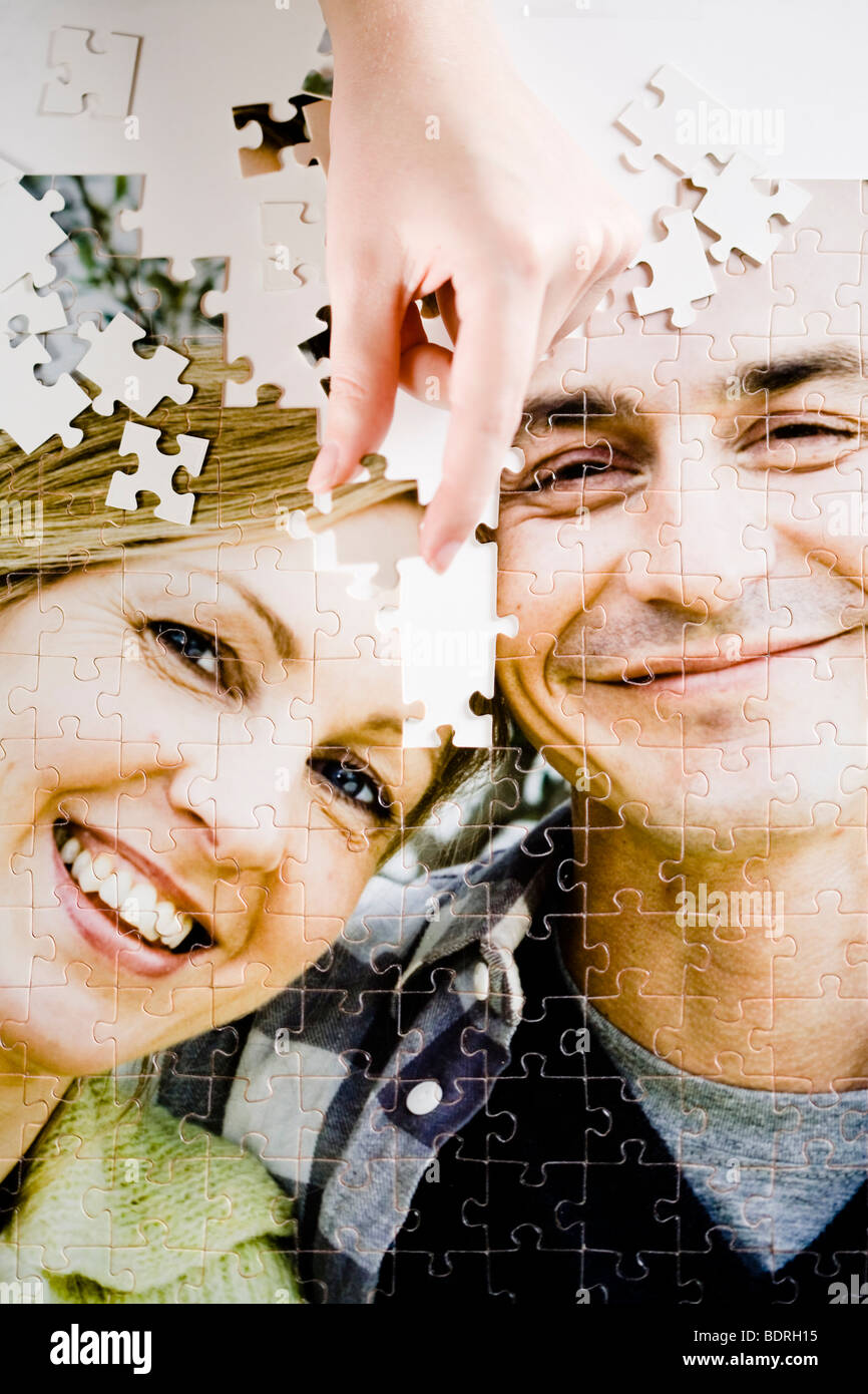 A puzzle with the image of a couple. Stock Photo