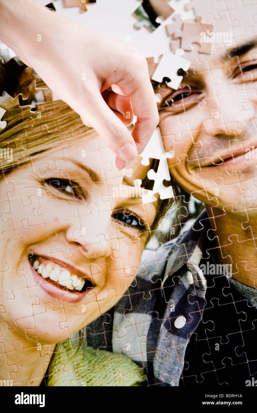 A puzzle with the image of a couple. Stock Photo