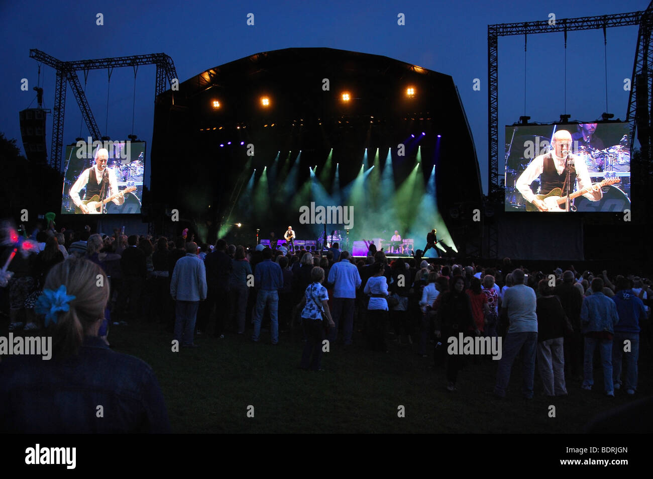 stage and video screens at Glastonbury Extravaganza 2009, with Status Quo on stage Stock Photo