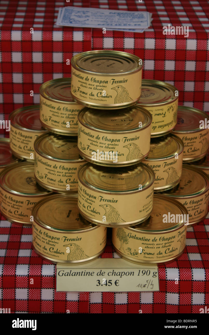 Tins of  galantine de chapon sold at the weekly market in Lectoure, Gers Stock Photo