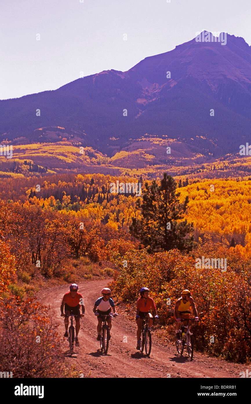 bicyclists near Ouray, San Juan Mountain Range, Colorado Stock Photo