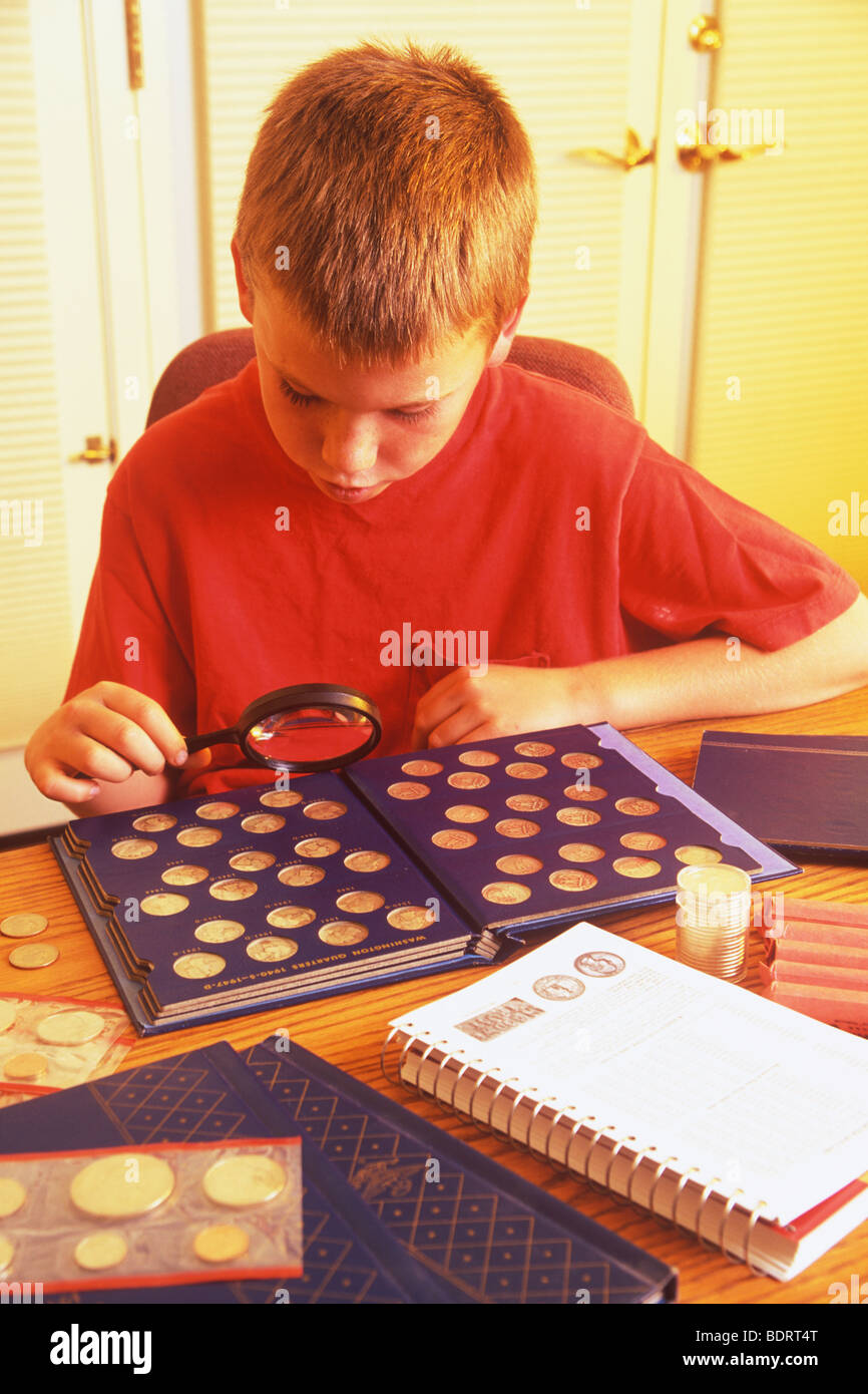 boy and his coin collection, Santa Barbara, California Stock Photo