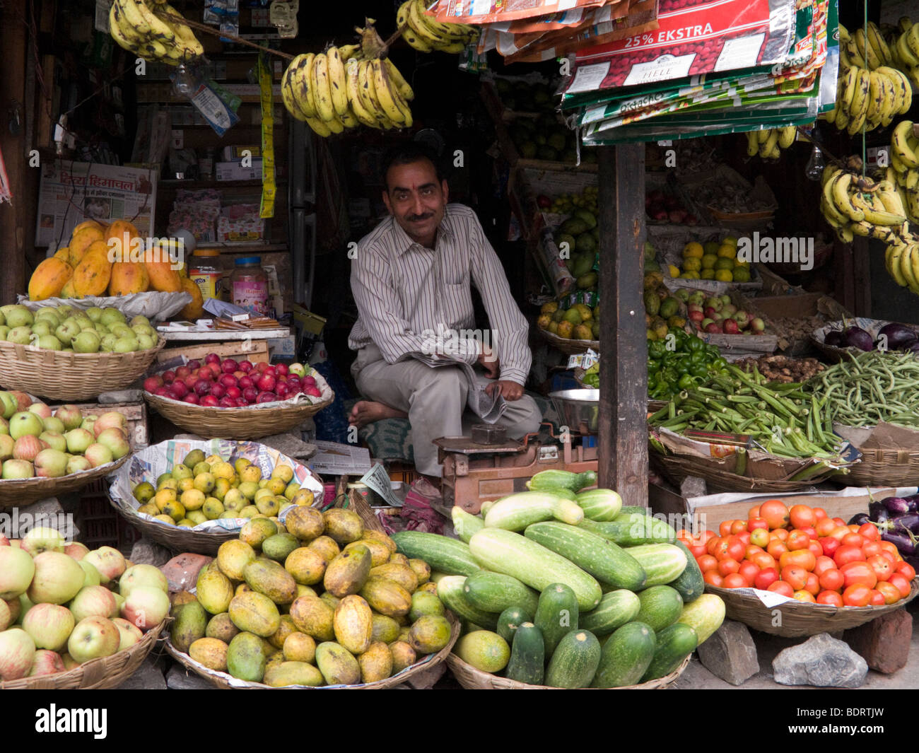 Street market shop seller with his quality fresh fruit and vegetables. Street market stall. Dalhousie. Himachal Pradesh. India. Stock Photo
