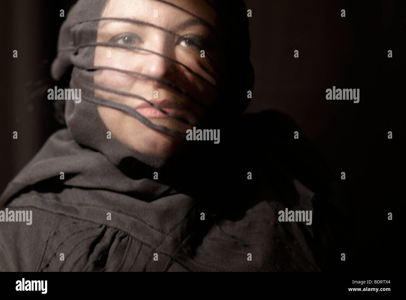 Young woman wearing black and a veil, portrait Stock Photo - Alamy