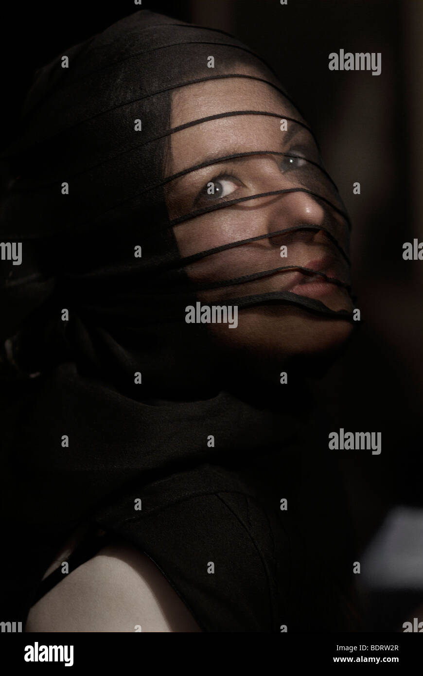 Young woman wearing black and a veil, portrait Stock Photo - Alamy