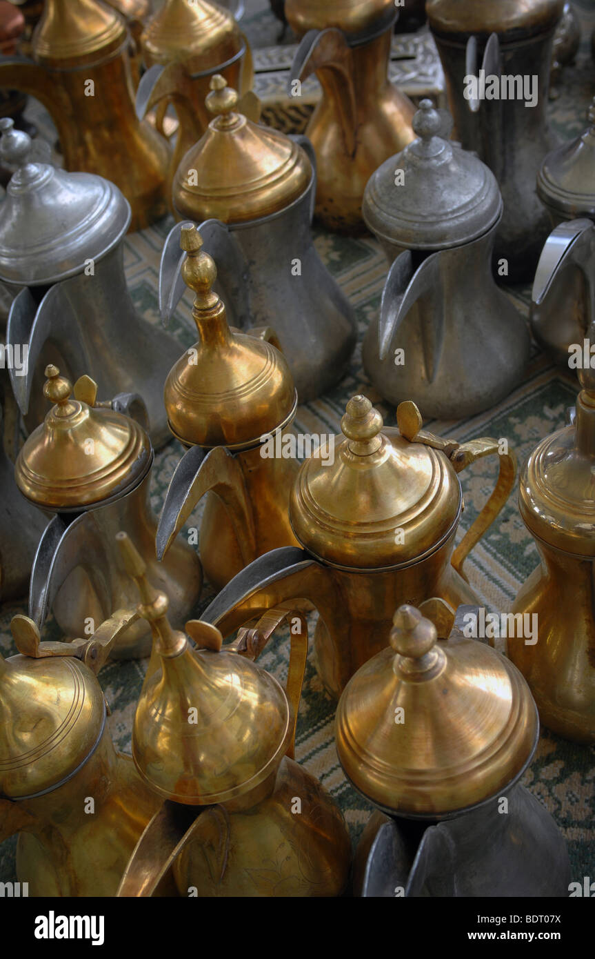 A collection of second hand coffee pots for sale at the Friday Market, Kuwait City, Kuwait. Stock Photo