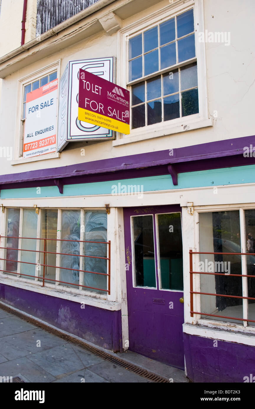 Closed run down shop for sale in town of Brecon Powys Wales UK Stock