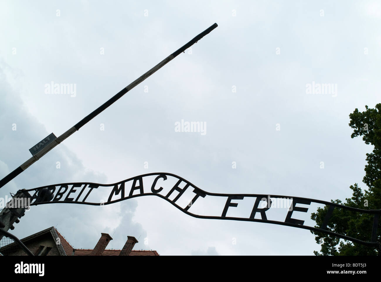 Arbeit macht frei! Slogan at the entrance of Auschwitz, World War 2 concentration camp. Stock Photo