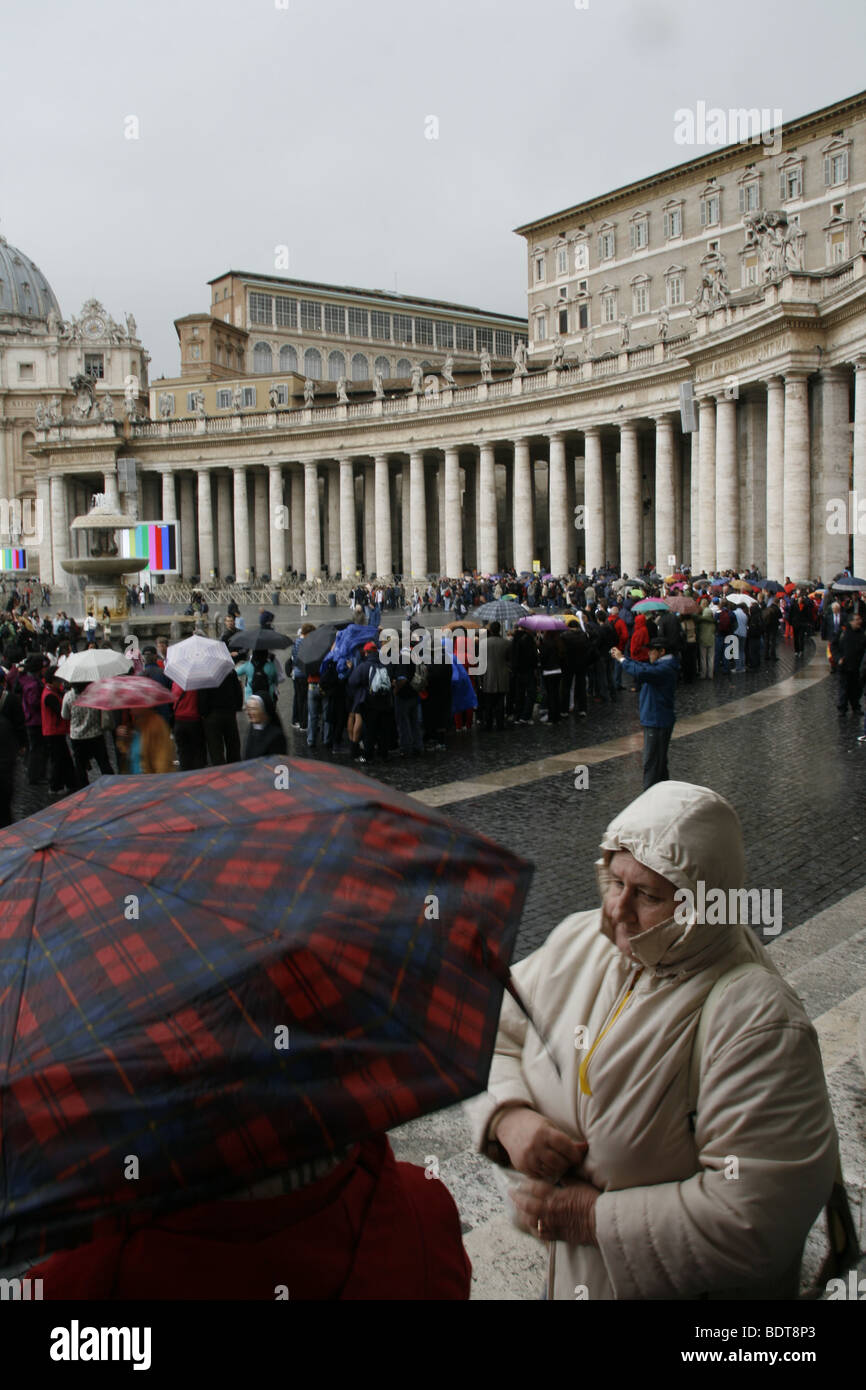 people with umbrellas in rain in vatican, rome Stock Photo Alamy