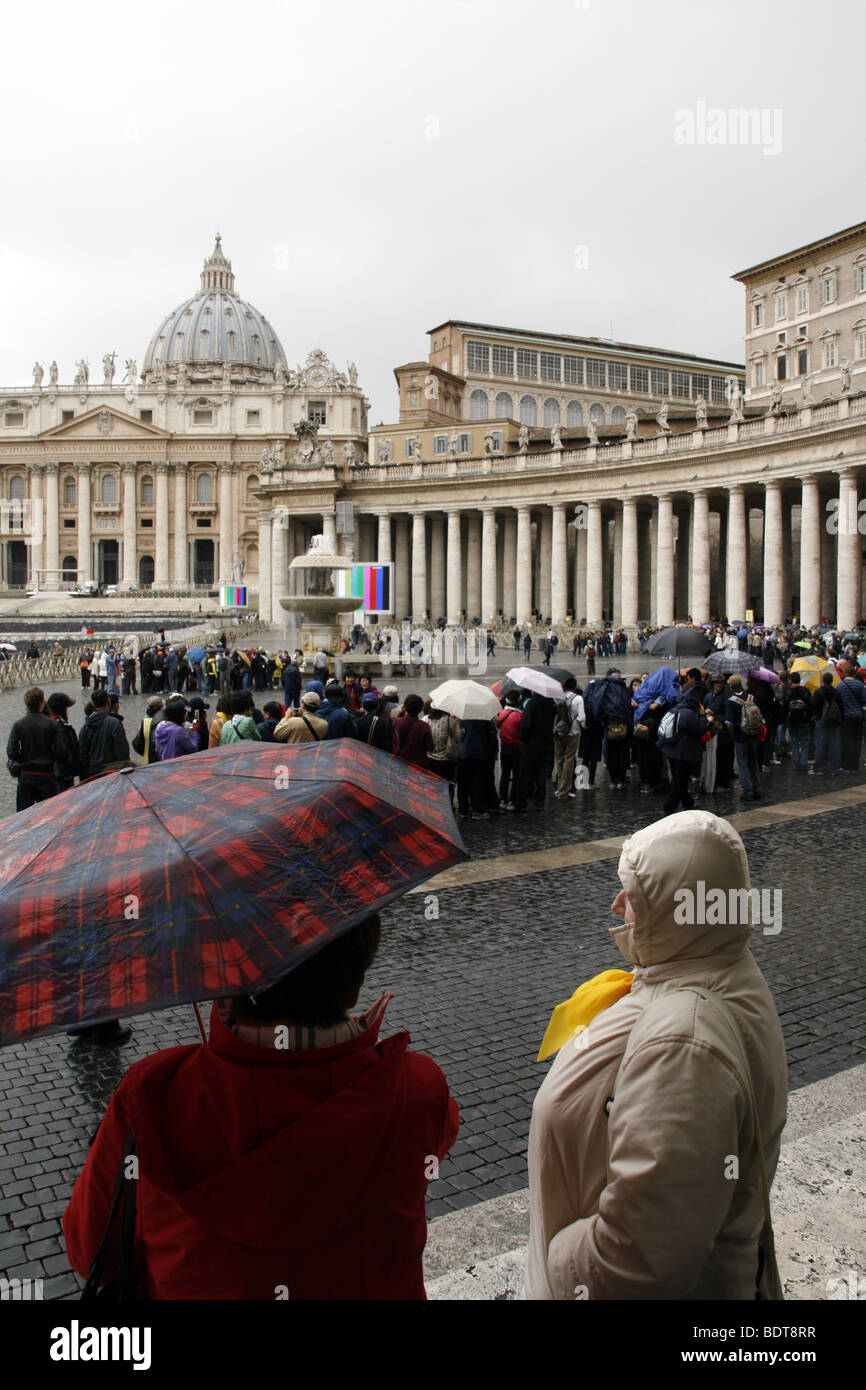 people with umbrellas in rain in vatican, rome Stock Photo Alamy