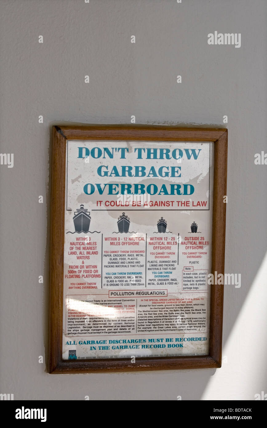 Notice on board Queen Mary 2 about garbage disposal Stock Photo Alamy