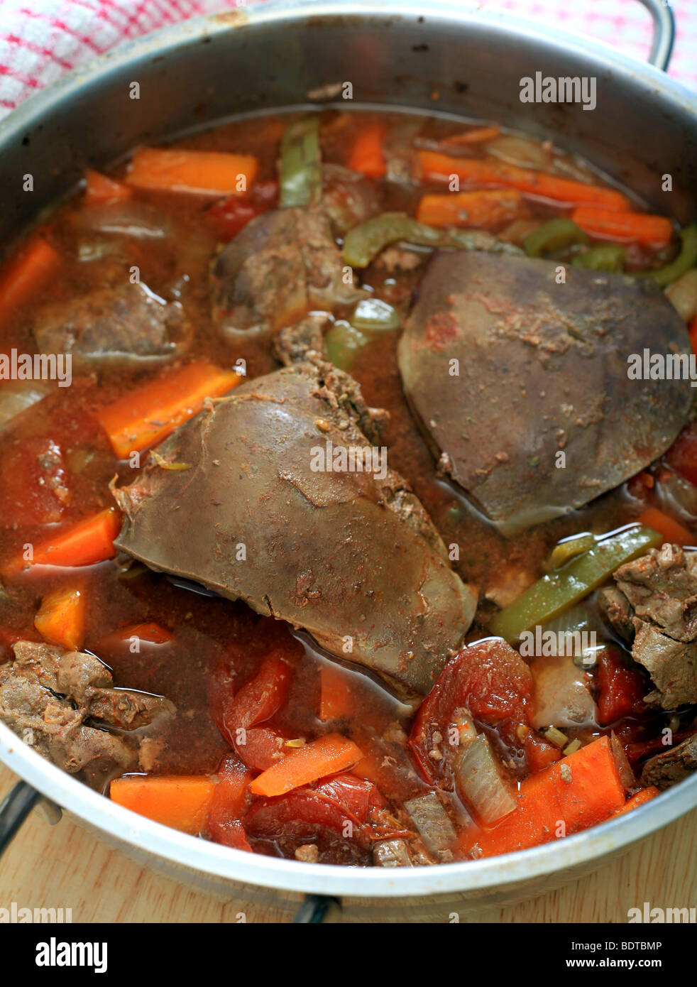 Vertical view of a pot of lamb's liver and vegetable casserole. Stock Photo