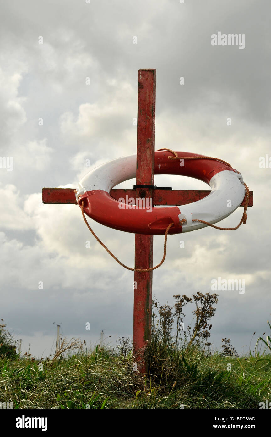 life saver bouy aid rescue swimming coast swimming bathing seaside danger Stock Photo