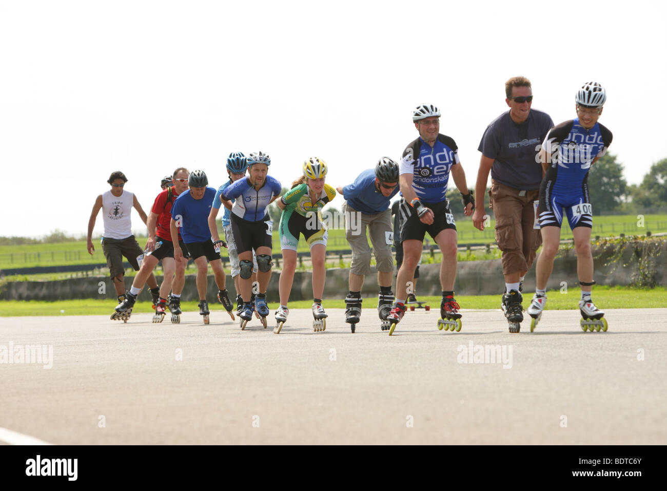 Speed skaters in line racing in a charity race Stock Photo