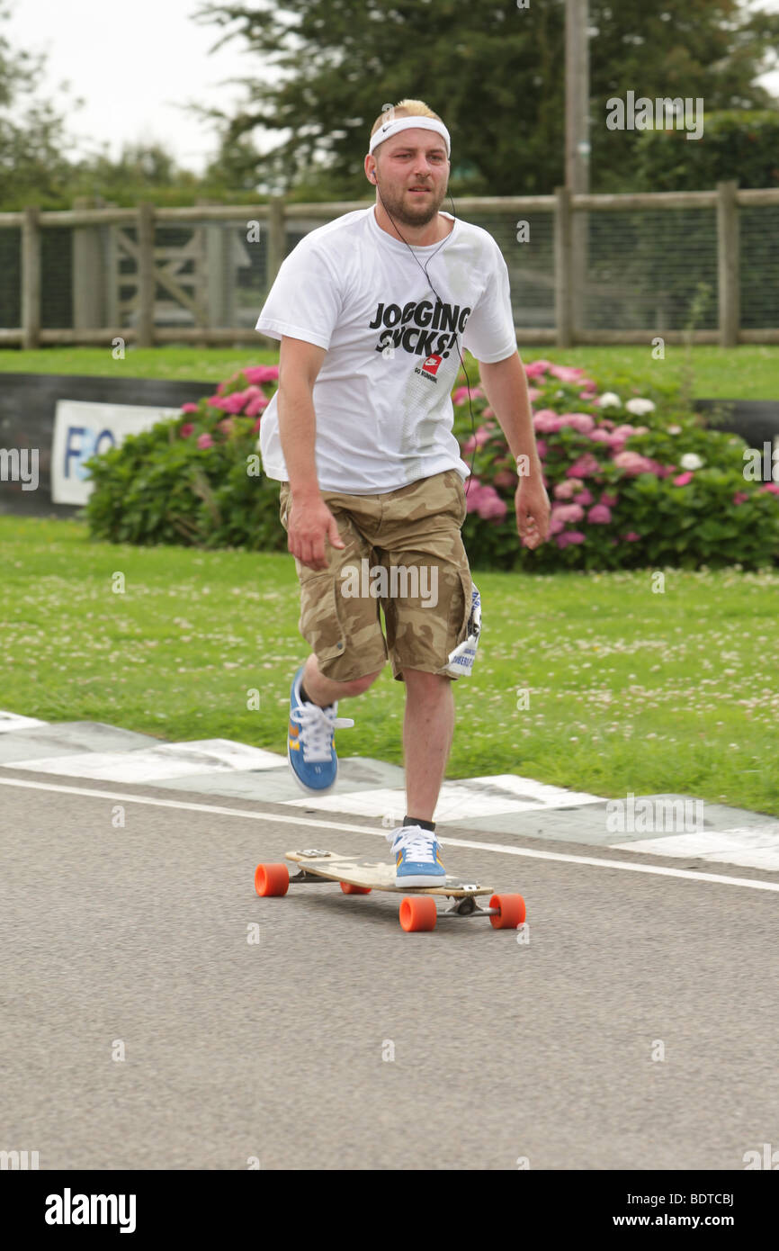 Single skateboarder in a charity marathon Stock Photo