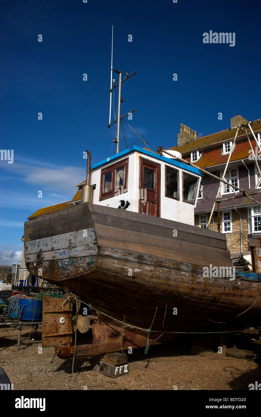 West Bay Dorset UK Harbour Harbor Quay Fishing Boat Houses Stock Photo ...