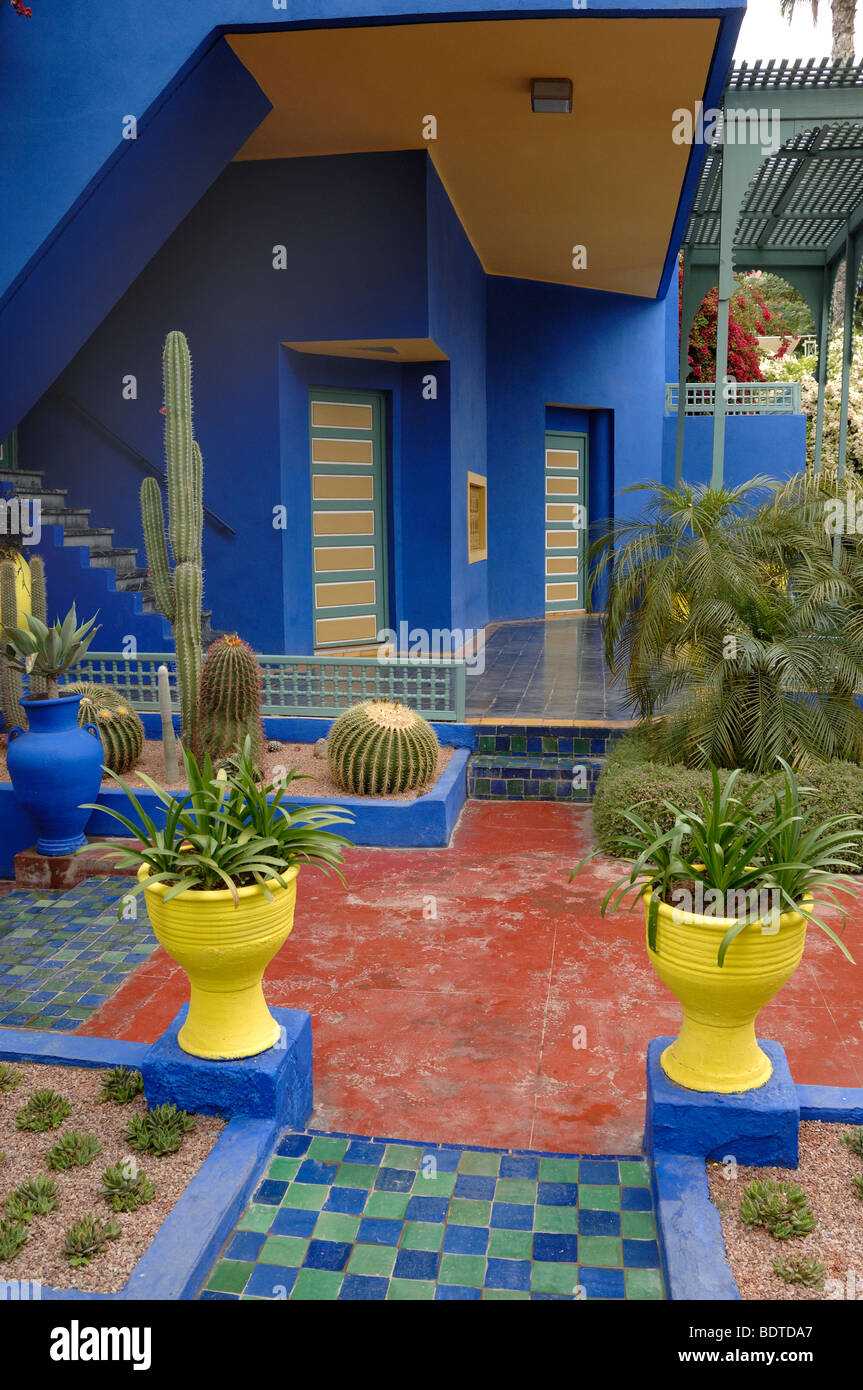 Multi-coloured Moroccan Garden, Yellow Planters, Blue House & Museum, Jardin Majorelle or Majorelle Gardens Marrakesh Morocco Stock Photo