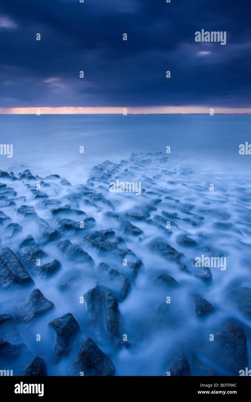 Washed tide over rock ledges at Kilve, Somerset, England. Spring (May) 2009 Stock Photo