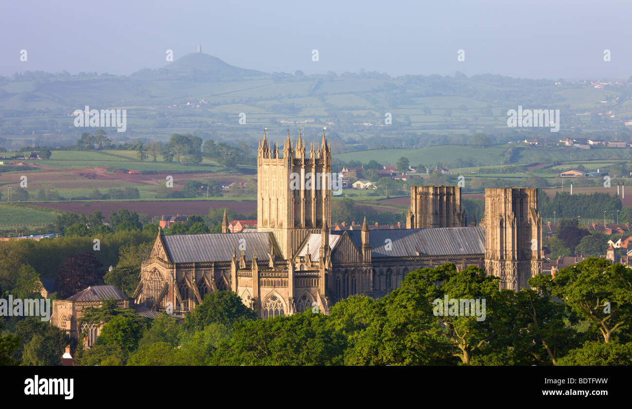 Wells Cathedral and Glastonbury Tor on a misty Spring morning, Wells, Somerset, England. Spring (May) 2009 Stock Photo