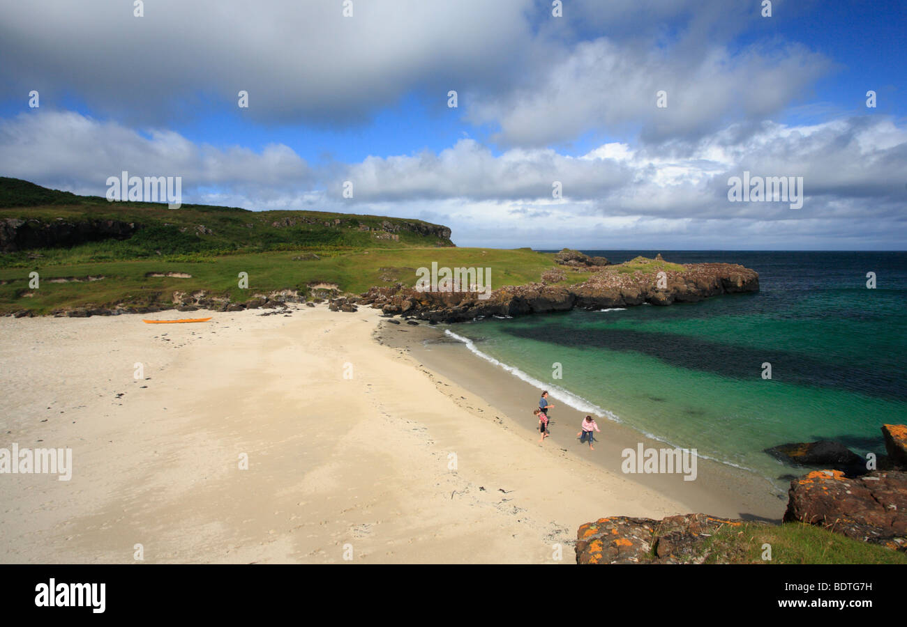 A Mum and two daughters enjoying the beautiful beach at Port Langamull on the Isle of Mull, Scotland. Stock Photo
