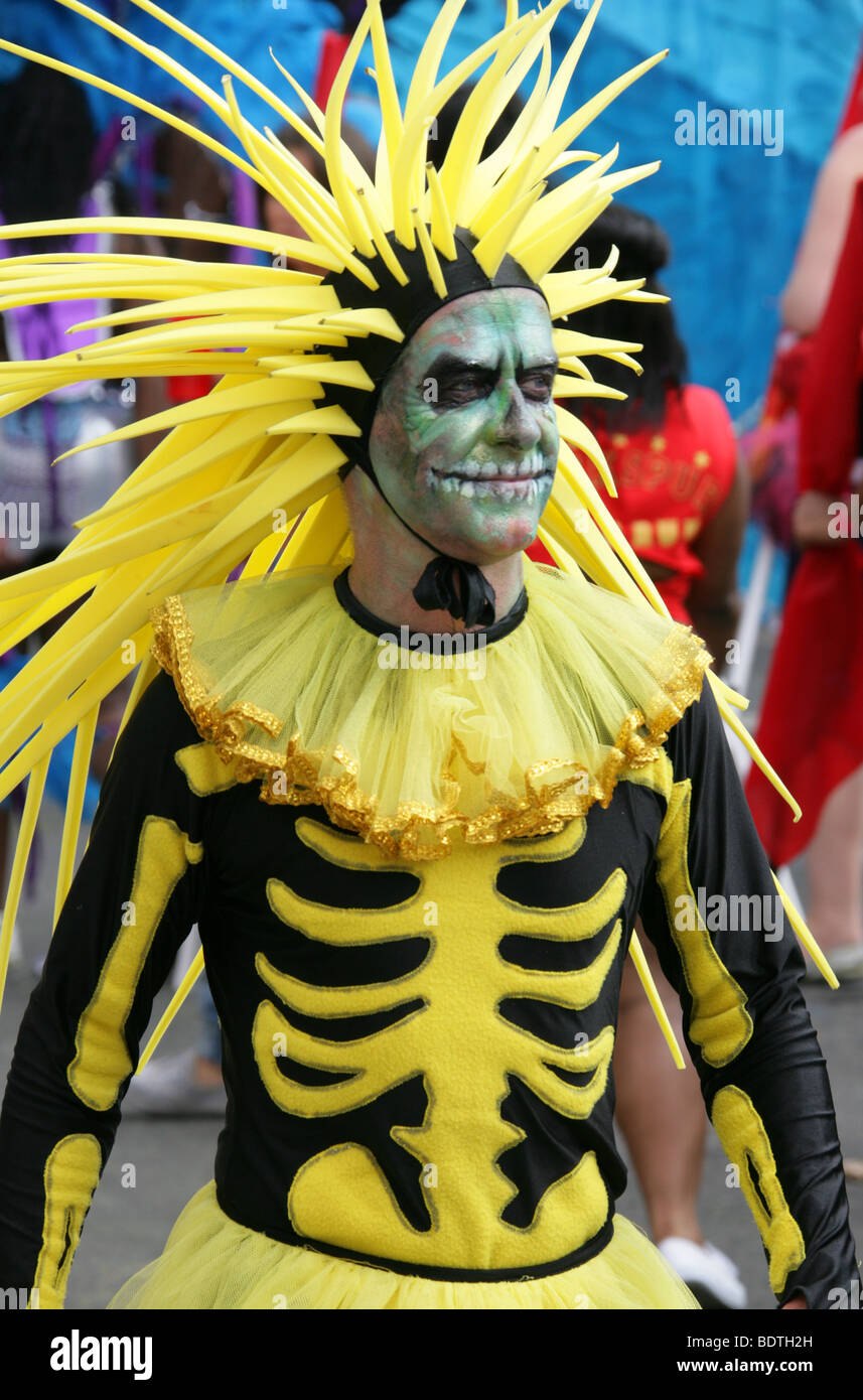 Man in a Scary Yellow and Black Costume at the Notting Hill Carnival 2009 Stock Photo
