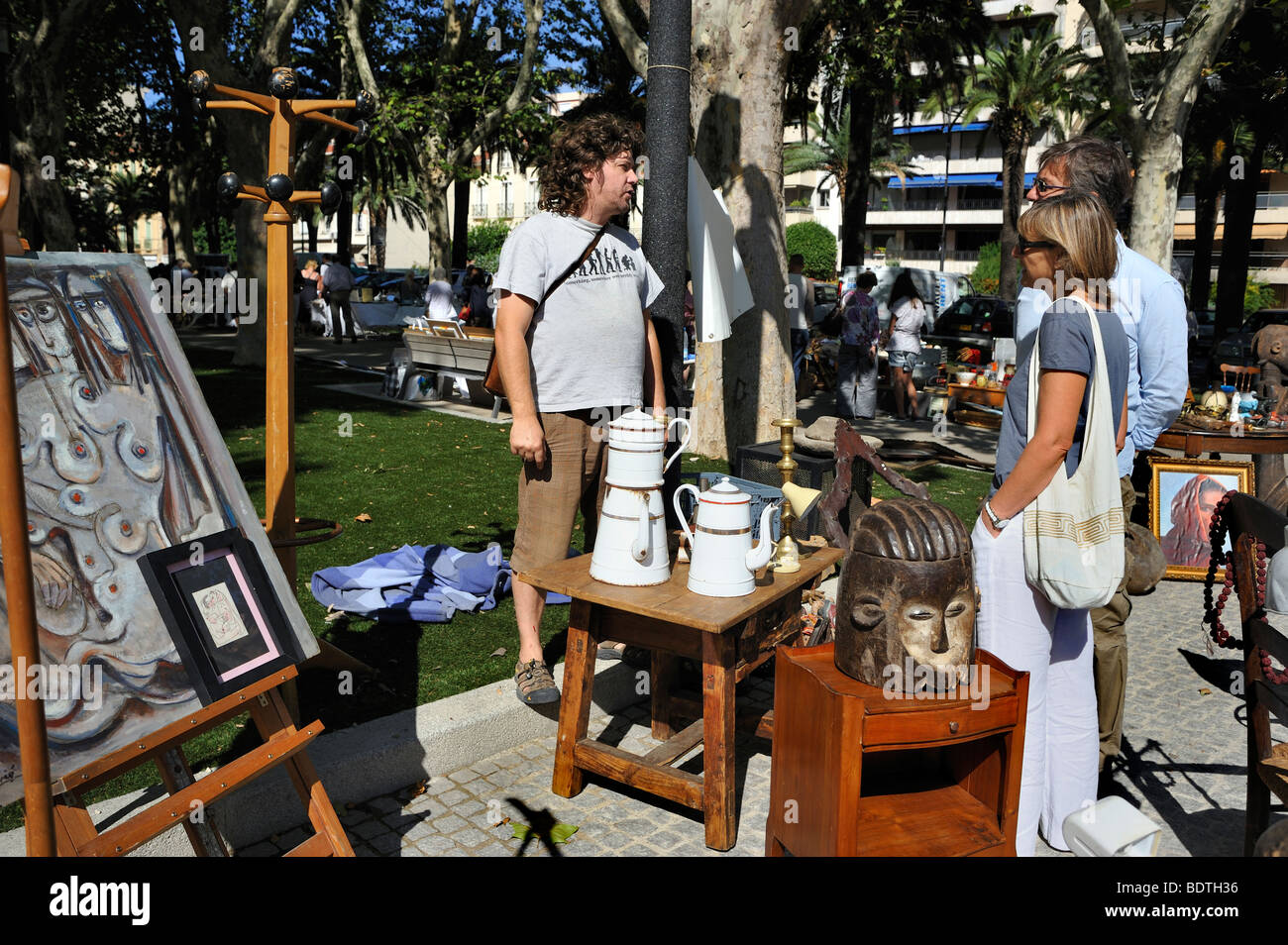 Perpignan, France, Couple Shopping in Outside French Antiques Market, Stall, Display, Brocante vintage Stock Photo