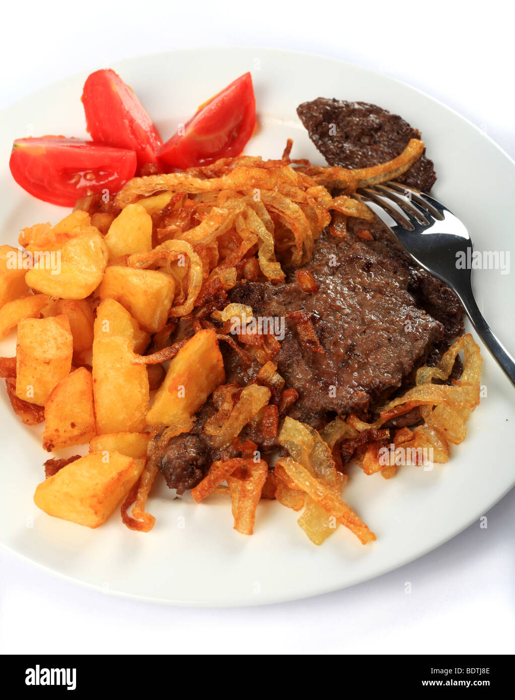 Traditional Austrian zweibelrostbraten, beef escalope with crispy fried
