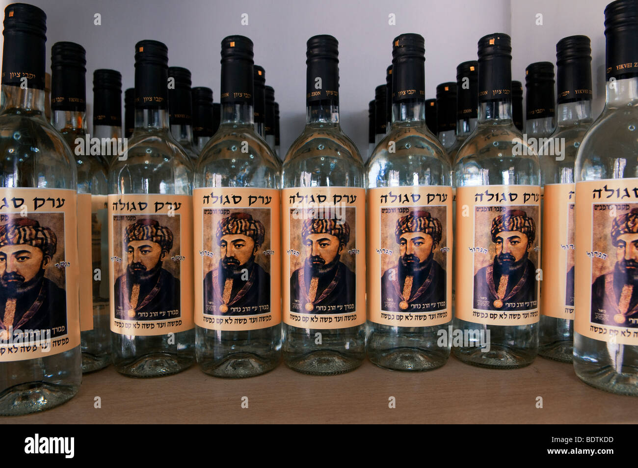 Bottles of arak or araq distilled spirit bearing the image of Rambam,  a medieval Sephardic Jewish philosopher and Rabbi for sale in Tiberias Israel Stock Photo