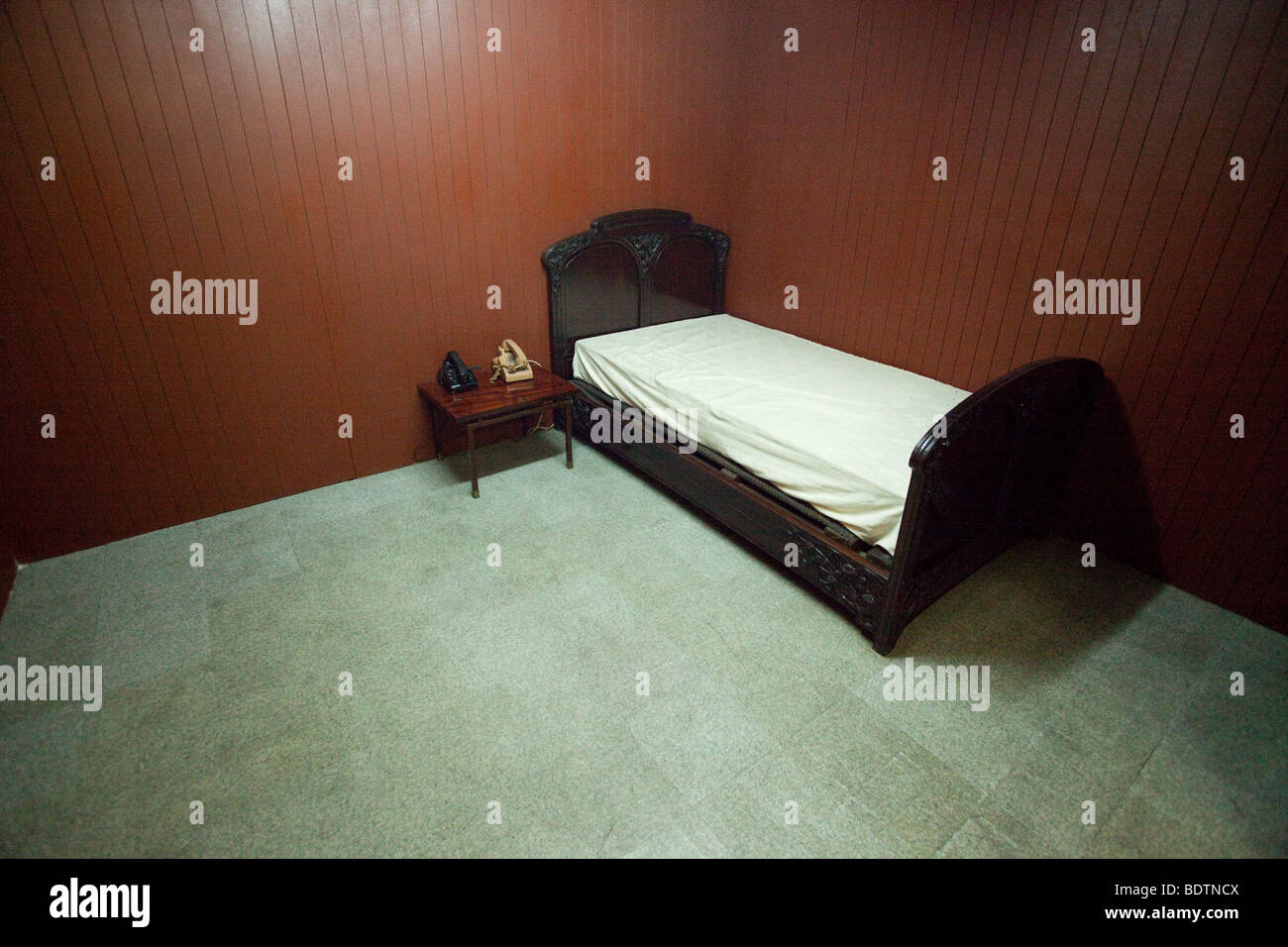Presidents bed and sleeping quarters at the Reunification Palace in Saigon Stock Photo