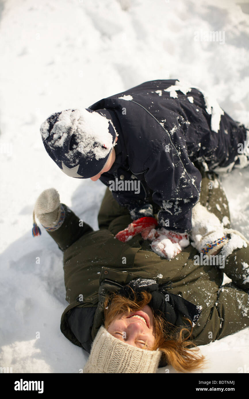 Mother and son playing in the snow Gotland Stock Photo