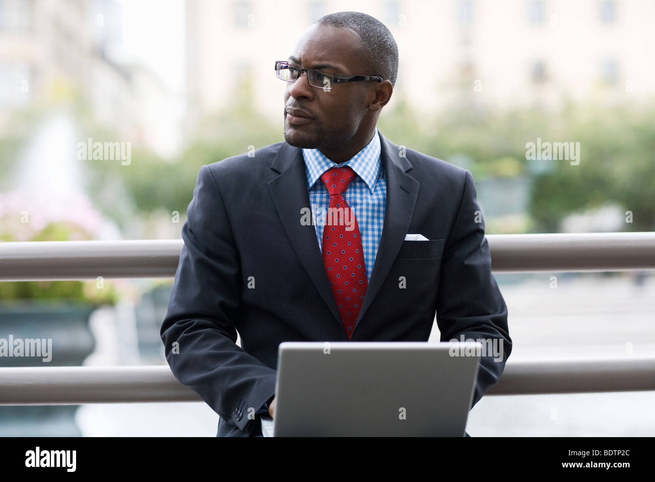 A businessman using a laptop Stock Photo