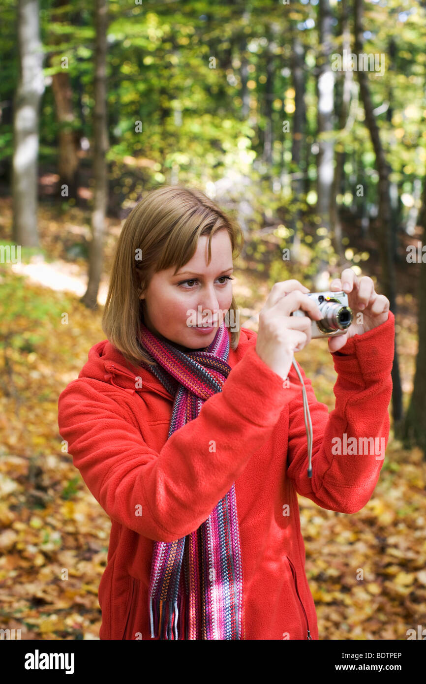 A woman taking a picture Stock Photo