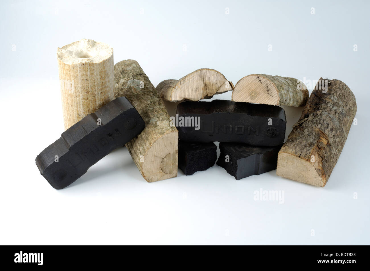 Brown coal or lignite and wood briquette Stock Photo