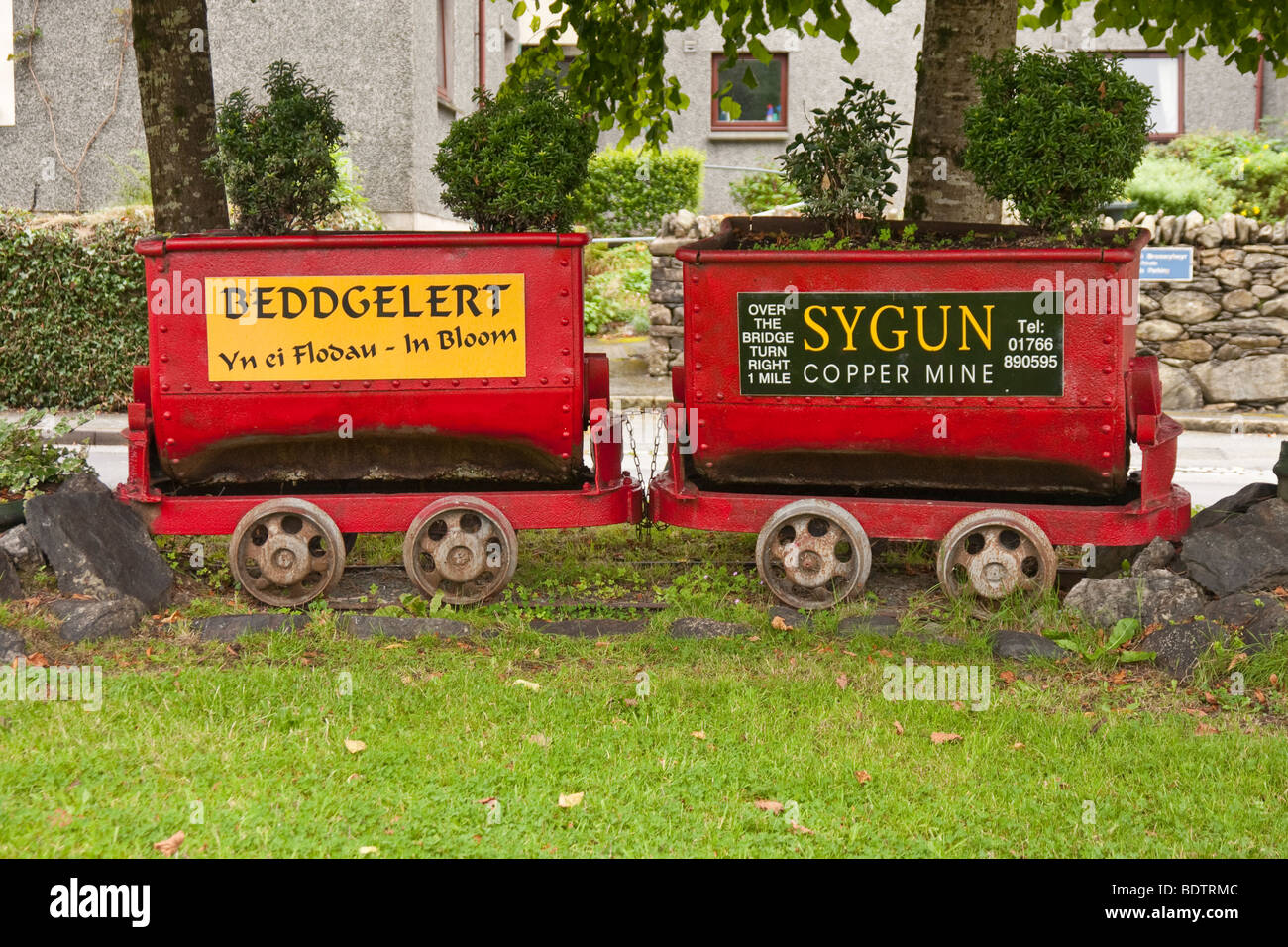 advertisement for Sygun 'copper mine' on some old carriages Stock Photo